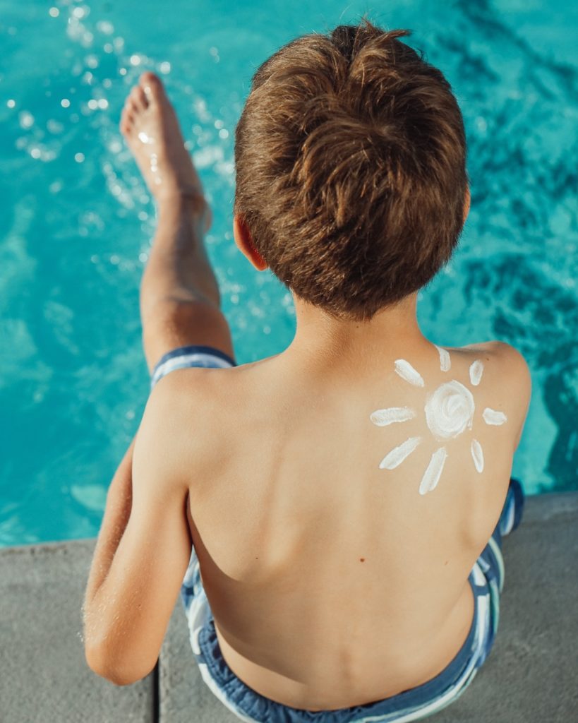 Boy with sunscreen
