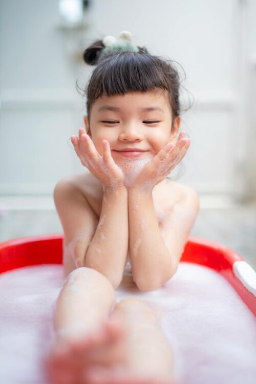 Asian girl in bath